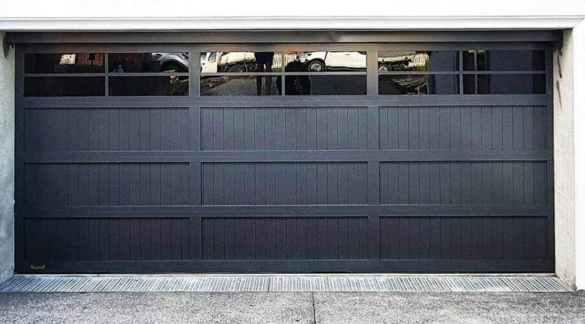 Professional technician providing expert garage door repair services in Jupiter, FL
