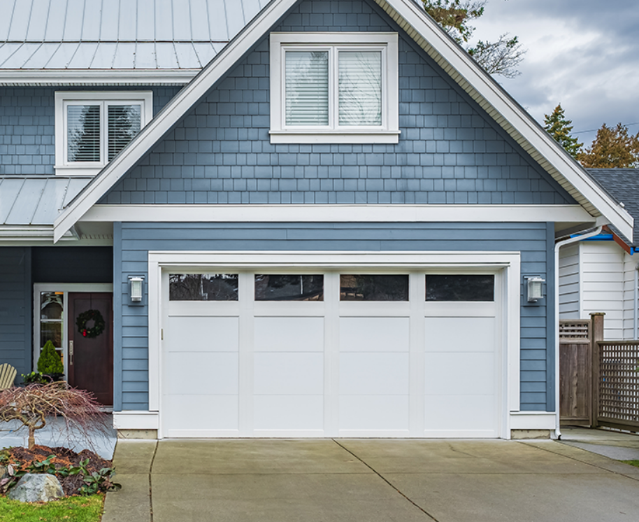ustom garage door with contemporary design and high-quality materials, installed by expert technicians in Jupiter, FL, showcasing premium garage door repair services.