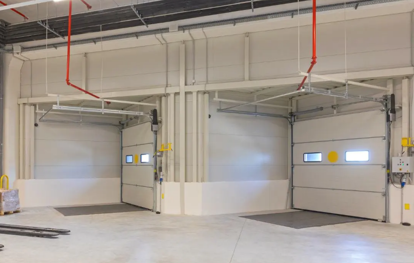 a modern commercial garage door in Jupiter, Florida, showcasing durability and sleek design for reliable repair services.